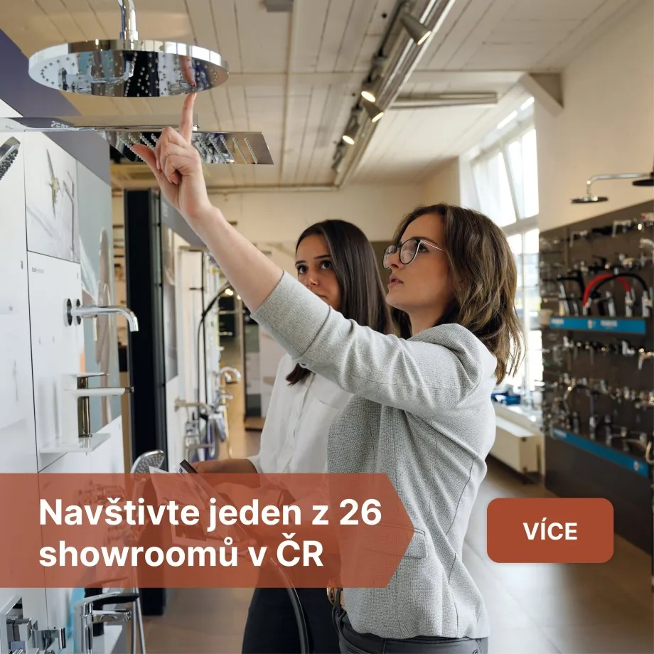 béžová mozaika v detailu na stěně sprchového koutu